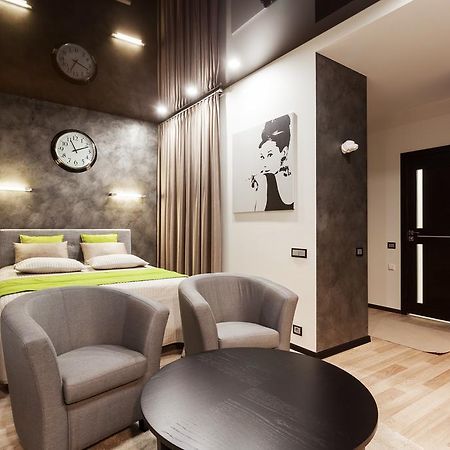Raugyklos Apartamentai Вилнюс Стая снимка